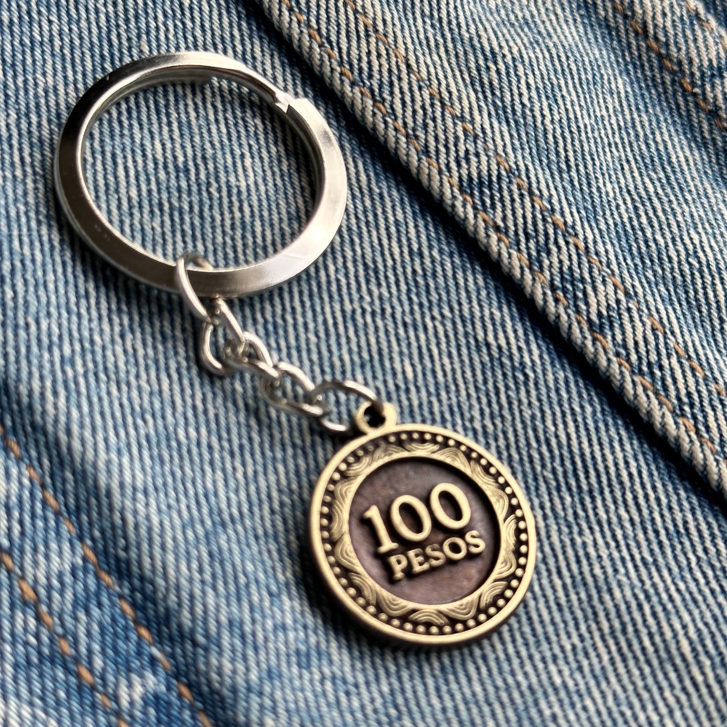 Llavero Moneda $100 (Nueva)