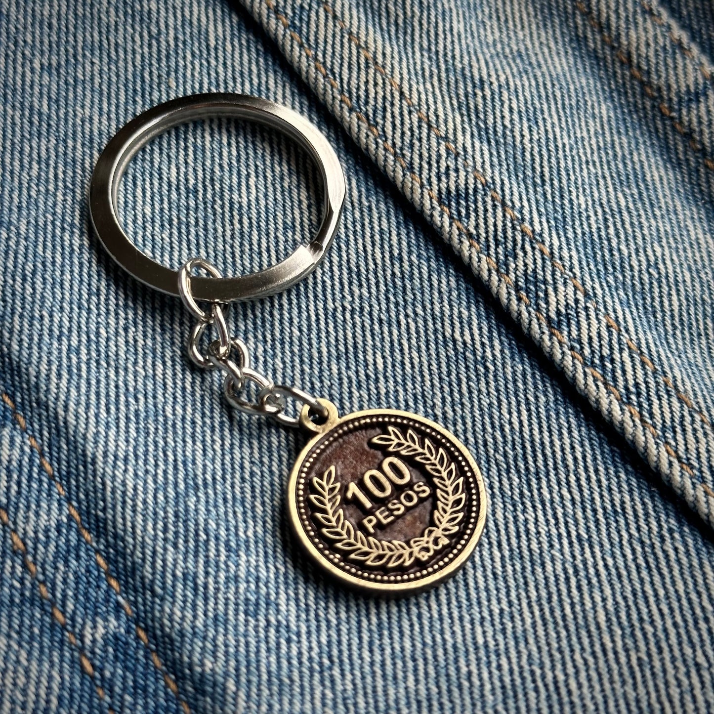 Llavero Moneda $100 (Antigua)